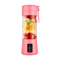 Pink portable electric juicer blender with fruit pieces and silicone carrying strap - Pink