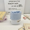 Detail view of blue plaid fabric drawstring pouch for stationery and desktop storage - Blue Plaid