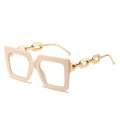 Square oversized beige fashion glasses featuring bold gold chain metal temples - Pink