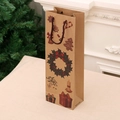 Tall Christmas kraft paper wine gift bag with festive wreath print and twisted rope handles - Kraft Paper [Style 3 - Xmas Ornament Wreath]