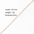 Detail view of 1mm thin gold stainless steel chain with 40+5cm length and 2g weight - O-Chain Stainless Steel