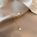 Elegant gold tulip necklace with mother of pearl inlay and a white pearl drop detail - Titanium Steel Gold Style (X533)