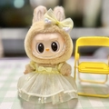 Labubu plush doll wearing a yellow rabbit costume and tutu skirt with a bow - Yellow Sequined Tulle Dress / First And Second Generation Keychains Are Compatible With La Cloth Dolls. Dolls Not Included.