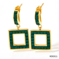 Close-up of golden square earrings with inset green gemstones and polished metal finish - Square Hollow Green Gemstone Earrings (KDE611)