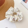 Chiffon floral scrunchie in beige with purple and yellow flower patterns for women - Tulip Purple