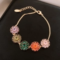 Bracciale placcato oro 18K con ciondoli a fiore in zirconia colorata e finitura lusso - Oro-Multicolore
