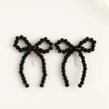 Elegant black beaded bow earrings with silver pins for a stylish minimalist look - Black Beaded Bow (1036) / Black