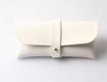 White faux leather storage case with flap closure and silver rivet for sunglasses - White Glasses Case