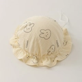 Detail of ruffled beige baby bonnet featuring rabbit prints and soft double gauze cotton - 35-43cm (0-12 Months) / Happy Rabbit
