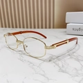 Retro-Oval-Sonnenbrille mit goldenem Metallrahmen und rotbraunen Bügeln in Holzoptik - Goldener Rahmen Klare Gläser