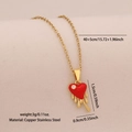 Golden stainless steel necklace featuring a red melting heart pendant with size details - Melted Heart
