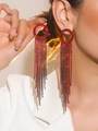 Elegant long red tassel earrings with sparkling rhinestones on a female model - Hoop with Red Long Tassel