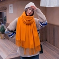 Classic orange wool cashmere blend scarf with tassels styled for winter warmth - Orange