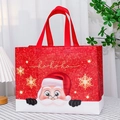 Red Christmas non-woven gift bag featuring Santa Claus print and shimmering ho ho ho text - Christmas Style 44