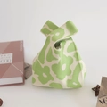 Knitted flower gift bag with green and beige floral pattern and knot handle - Mung Bean Green Flowers