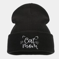 Close-up of Cat Mom embroidery on a black ribbed knit beanie for autumn winter fashion - One Size / Black