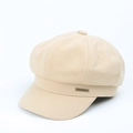 Detailed view of beige wool octagonal newsboy hat with JHMY metallic logo emblem - M (56-58cm) / Beige