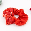 Close-up of red Christmas scrunchie with snowflake prints and festive pine branch decor - Christmas Print 09# Red (Balloon+Gift)