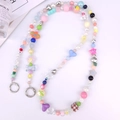 Colorful macaron beaded phone strap with acrylic heart and star charms on white backdrop - Colorful Series Beaded Chain