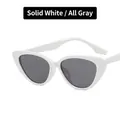 White cat eye sunglasses with gray lenses for a retro chic summer street style look - Solid White