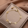 Gold-plated clover and cylinder pendant bracelet with cubic zirconia on brown silk - Small Waist Cylinder Bracelet / Gold