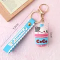 Porte-clés chat thé aux perles mignon avec sangle en silicone bleue et anneaux dorés - Chat Glace PVC Souple Dessin Animé / Bleu