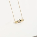 Golden choker necklace with black and white enamel cylinder pendant and red zircon stone - Black & White Enamel Cylinder Gold