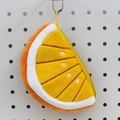 Cute orange slice plush coin purse keychain with soft fabric and secure zipper closure - Orange