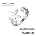 Adjustable silver stainless steel open ring featuring a minimalist cutout floral design - Silver