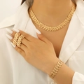 Elegant gold-tone mesh chain jewelry set featuring a wide necklace, bracelet, and rings - Set (Gold)