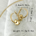 Chic gold stainless steel C-shape earrings with puffy heart charms in minimalist style - Puffy Heart