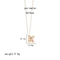 Detail of gold letter K pendant necklace with 40+5cm chain length and size specs - Letter K