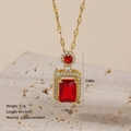 Detail view of gold necklace with red square pendant showing 40+5cm length and 3.7g weight - Red Gemstone Necklace
