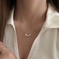 Detail of gold-plated necklace with five varying pearls on model for a chic look - Gold Pearl (42#)