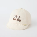 Dettaglio del ricamo a cane e del morbido tessuto in cotone sul cappello da sole bimbo - 50cm (1-3 anni) / Bianco Sporco