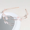 Detail of double-layered rose gold headband with pink gauze flowers and pearls - White
