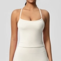 Dettaglio cuciture del reggiseno sportivo e tessuto spazzolato morbido beige crema - Taglia S / Top / Avorio chiaro