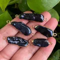 Irregular baroque pearl pendant set in deep purple with gold plated metal border - No.27 Width 9-12mm