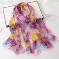 Long chiffon scarf with vibrant floral print and rolled edges on a white gift box - Rich Peony Rose Red