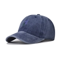 Close-up of violet lavender floral embroidery on a washed navy blue baseball cap - Adjustable / Orchid Navy Blue
