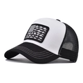 Detail view of truck hat featuring fish silhouette US flag patch on breathable mesh - Black and White (Black+White Flag Fish)