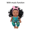 African vinyl baby doll with curly hair wearing blue cartoon outfit and musical function - 27CM Girl Doll Style 1