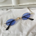 Retro polygon sunglasses with gold metal frames and translucent blue cat-eye lenses - Large Oval Gold Frame Blue Lens Retro