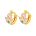 Macro shot of Hamsa hand and evil eye earrings with colorful enamel on gold plating - Pink (E750-3)