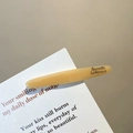 Elegant amber hair clip with Barrette La France text for stylish side bangs hair styling - Khaki