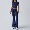 Women's deep blue two-piece set featuring short sleeve crop top and high-waist flare pants - S / Navy Blue