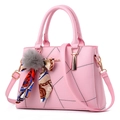 Pink PU leather handbag with decorative silk scarf, fur ball charm, and detachable strap - Pink