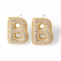 Golden stud earrings featuring letter B design with pave set clear cubic zirconia stones - Letter B