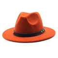 Detailed macro view of burnt orange wool fedora with black studded leather band - M (56-58cm) / Rust red