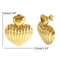 Detailed size view of golden heart earrings featuring a unique 3D ribbed shell texture - Earrings / Gold